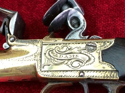 X X X SOLD X X X A good silver mounted, all brass English Flintlock pocket pistol engraved "ADAMS".