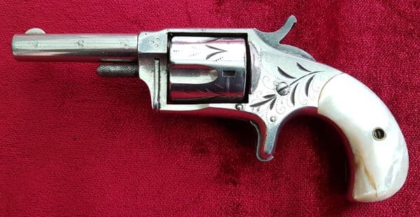 X X X  SOLD X X X  A Hopkins & Allen rimfire revolver with mother-of-pearl grips. c. 1875. Ref 9652.