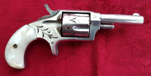 X X X  SOLD X X X  A Hopkins & Allen rimfire revolver with mother-of-pearl grips. c. 1875. Ref 9652.