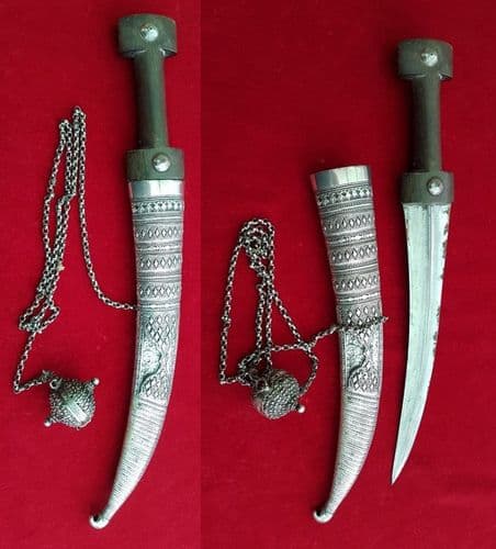 X X X SOLD X X  X  A Jambya dagger with silver covered scabbard. Ref 1765.