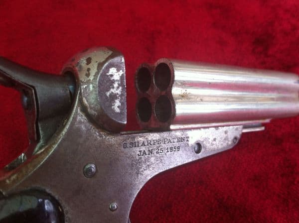 X X X  SOLD X X X  A Rare 4 brld Sharps rimfire Derringer, nickel plated, Bird's head grip. Obsolete