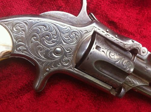 X X X SOLD X X X A Rare Engraved American Smith & Wesson Revolver circa 1870 .32 RIMFIRE. Ref