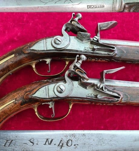 X X X SOLD X X X   A rare pair of brass mounted  flintlock pistols. Circa 1720-1740.  Ref 3781.