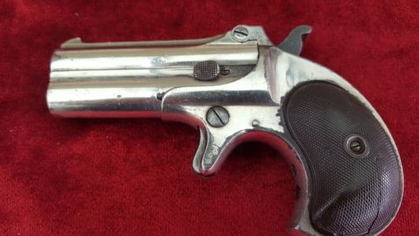 X X X  SOLD  X X X  A Remington .41 rim-fire  gambler's Derringer pistol. C. 1885. Ref 9132.