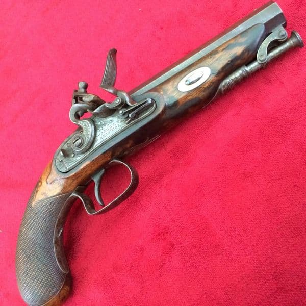 X  X X SOLD X  X X A scarce Napoleonic era Flintlock Pistol by Woolley of Bristol. Octagonal barrel,