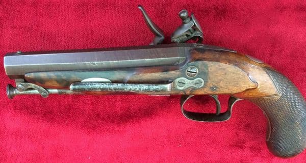 X  X X SOLD X  X X A scarce Napoleonic era Flintlock Pistol by Woolley of Bristol. Octagonal barrel,