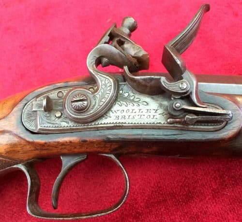 X  X X SOLD X  X X A scarce Napoleonic era Flintlock Pistol by Woolley of Bristol. Octagonal barrel,