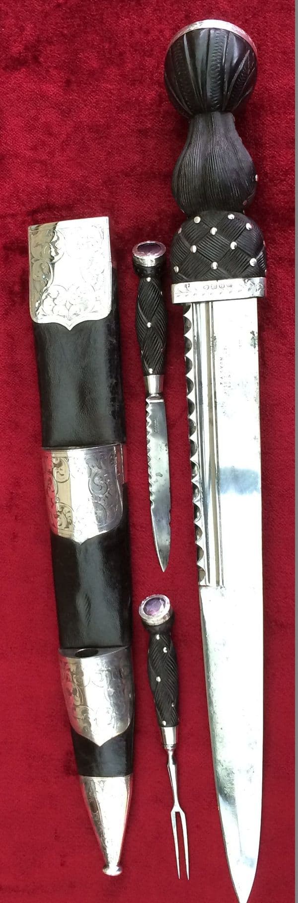 X X X SOLD X X X  A Scottish Dirk  1835. in silver mounted leather scabbardwith bi-knife. Ref 8702.