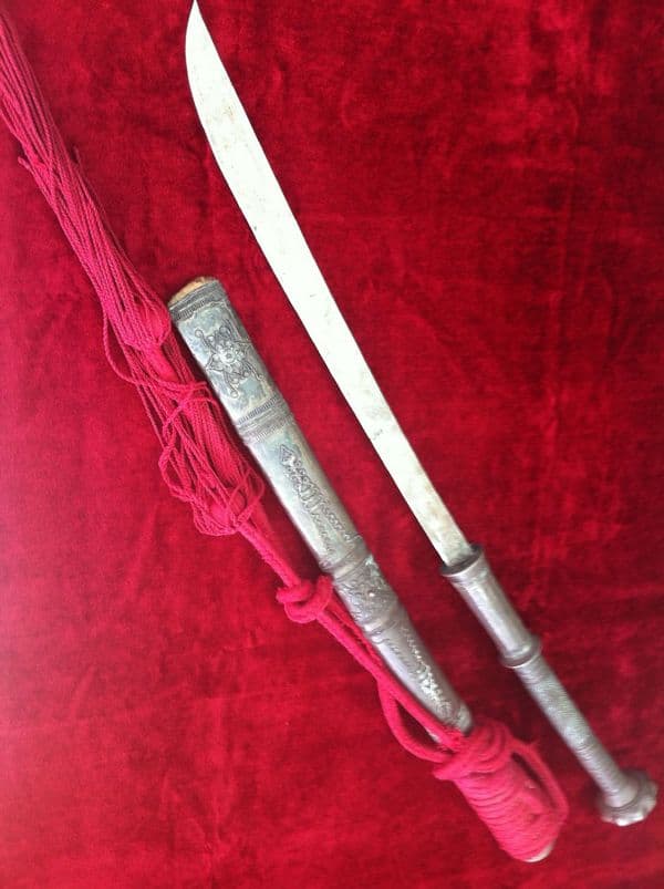 X X X   SOLD  X X X  A Silver Covered Burmese Dha sword. Complete with its original silver covered