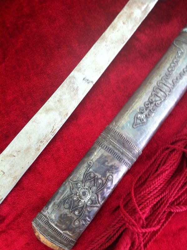 X X X   SOLD  X X X  A Silver Covered Burmese Dha sword. Complete with its original silver covered