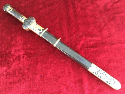 X X X SOLD X X X   A very rare CHINESE double short sword with carved wooden hilt, complete in its