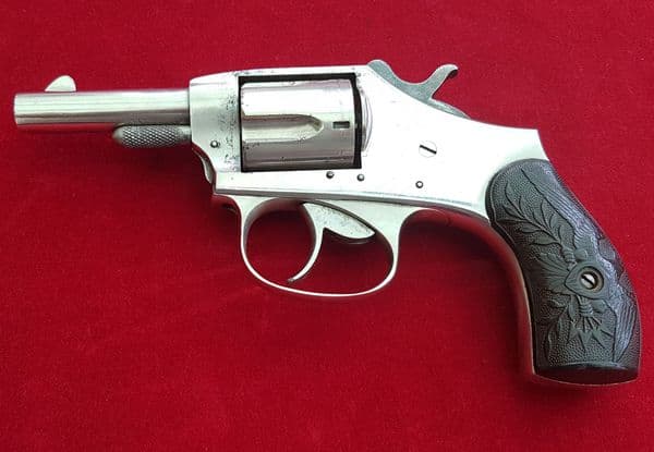X  X  X  SOLD X  X  X  American Eagle double action nickel plated .32 rimfire revolver. Ref 1537