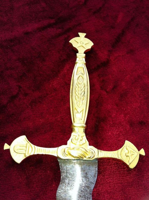 X X X SOLD X X X Brass hilted masonic dagger with Flamboyant blade. Probably 19th century. Ref