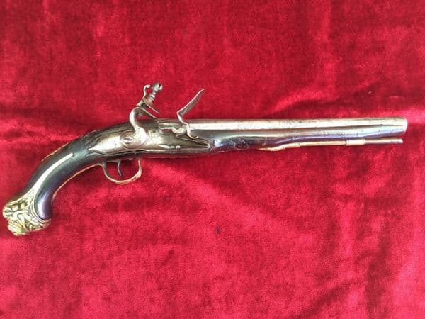 X  X  X SOLD X  X X  flintlock holster pistol  with embossed brass mounts. Good condition. Ref 7611.