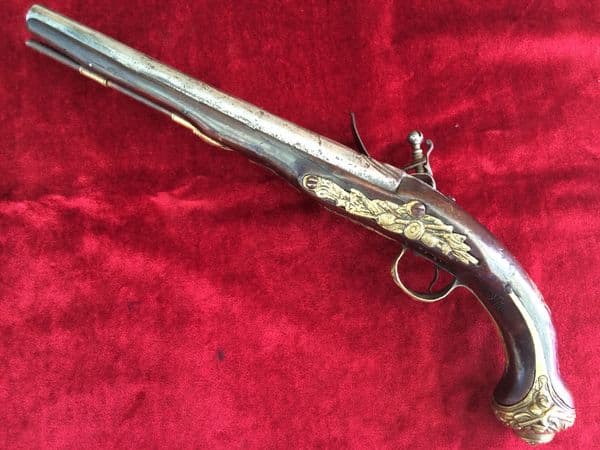 X  X  X SOLD X  X X  flintlock holster pistol  with embossed brass mounts. Good condition. Ref 7611.