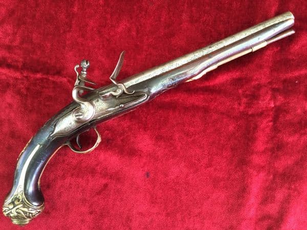 X  X  X SOLD X  X X  flintlock holster pistol  with embossed brass mounts. Good condition. Ref 7611.
