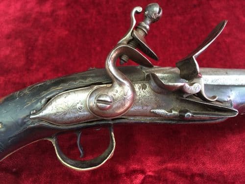 X X X SOLD X X X flintlock holster pistol with embossed brass mounts. Good condition. Ref 7611.