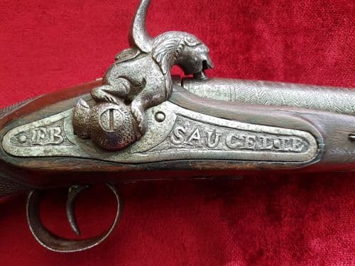 X X X SOLD X X X percussion pistol engraved SAUCELLE (ESPANA). Good condition. Ref 9773.