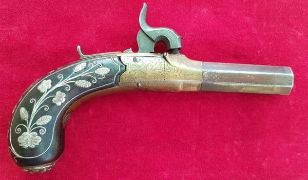 X X X  SOLD  X X X percussion pocket pistol inlaid with silver wire decoration.Ref 2540