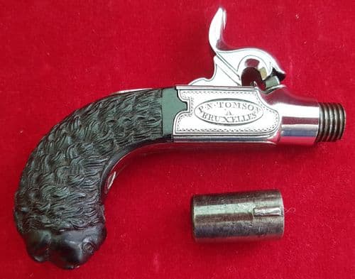 X X X SOLD X X X   Percussion single shot pocket pistol the butt carved as a Lion's head. Ref 1695.