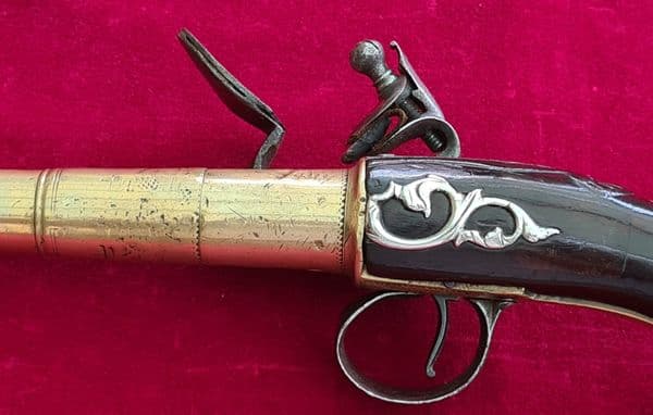 X X X SOLD X X X Queen Anne style brass framed Silver mounted Flintlock pistol by HEYLIN . Ref 4029.