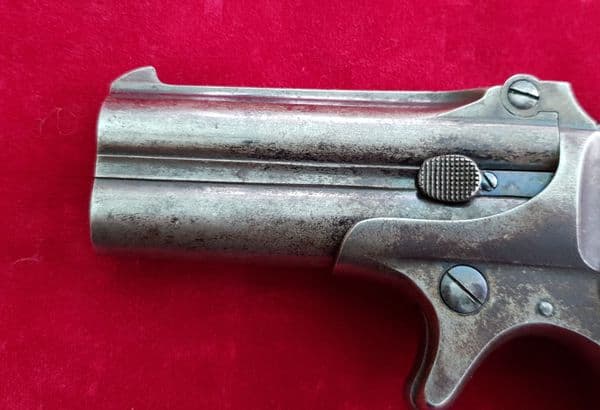 X X X  SOLD  X X X Remington .41 rim-fire Derringer pistol with Mother-of-pearl grips.  Ref 1921.