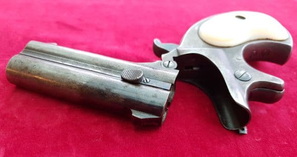 X X X  SOLD  X X X Remington .41 rim-fire Derringer pistol with Mother-of-pearl grips.  Ref 1921.