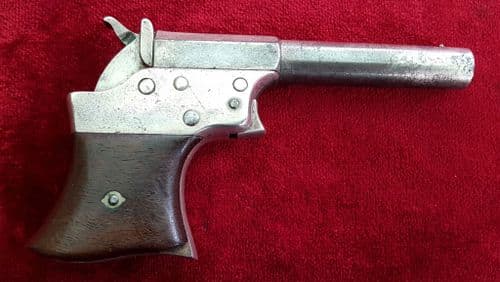 X X X  SOLD X X X Remington .41 rim-fire single shot derringer.  Good condition. Ref 9754.