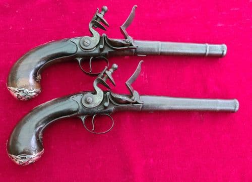XXX SOLD XXX Pair of Queen Anne silver mounted flintlock pistols by HAWKS of OXFORD. Ref 3732.