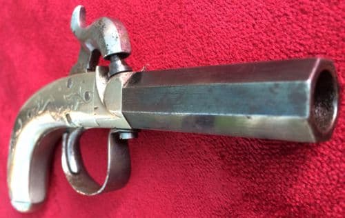 XXX SOLD XXX Single barrel Percussion pocket pistol with nickel silver grips. Ref 8906.