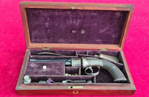 XXX SOLD XXXEnglish .36 calibre Percussion 6 shot Transitional revolver, complete in case. Ref 3954.