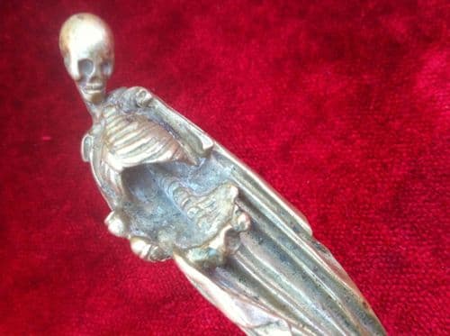 XXXX SOLD XXXX A very Fine 19th century Brass hilted dagger, The hilt formed in the shape of a