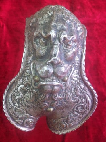 XXXX SOLD XXXX An interesting 19th Century piece of embossed armour with Lion's head. Probably