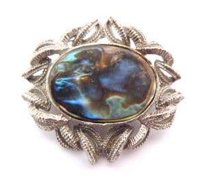 Vintage Abalone Shell And Ornately Bordered Brooch.