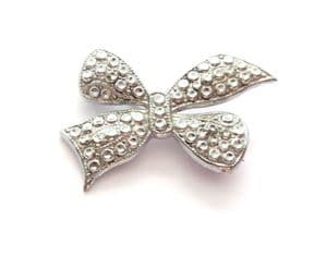 Vintage Small And Dainty Stay Bright ' Staybrite ' faux marcasite Bow Design Brooch