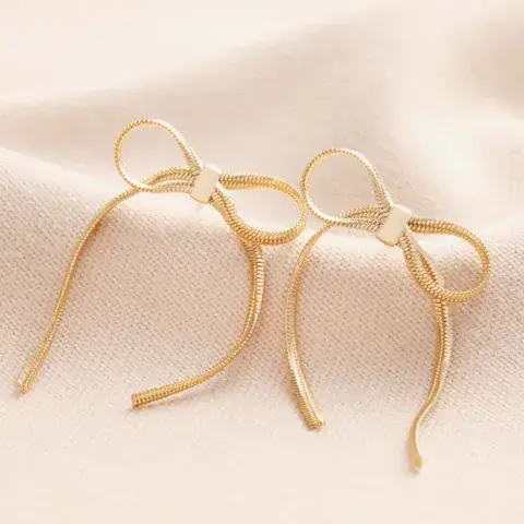 BOW SNAKE CHAIN STATEMENT STUD EARRINGS IN GOLD