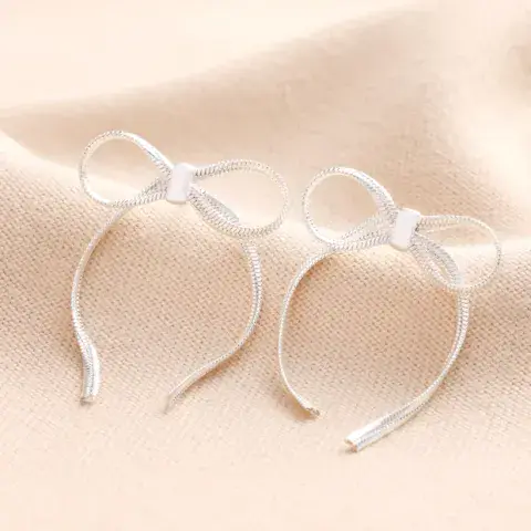 BOW SNAKE CHAIN STATEMENT STUD EARRINGS IN SILVER