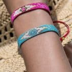 BRIGHT PINK 'EVIL EYE' HANDLOOMED BEADED RIBBON BRACELET