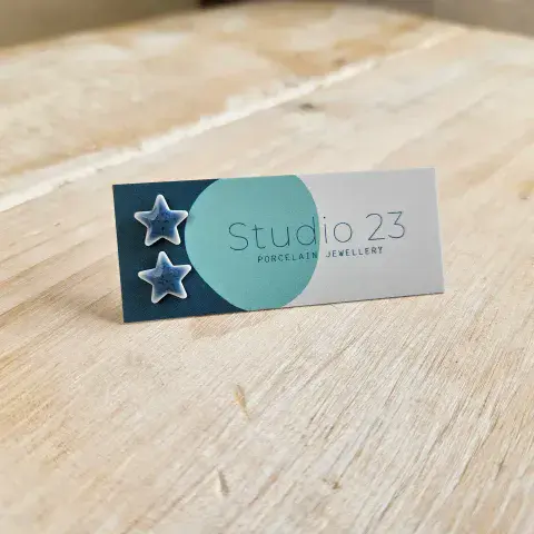 CERAMIC STAR STUD EARRINGS