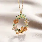 CRYSTAL FLOWER & BEE DROPLET NECKLACE