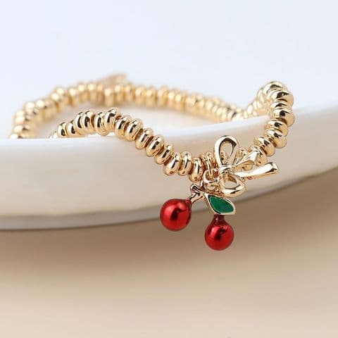 GOLDEN BOW & CHERRIES CHARM BRACELET
