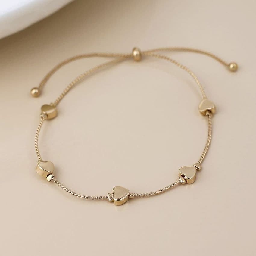 GOLDEN MULTI HEART STATION BRACELET