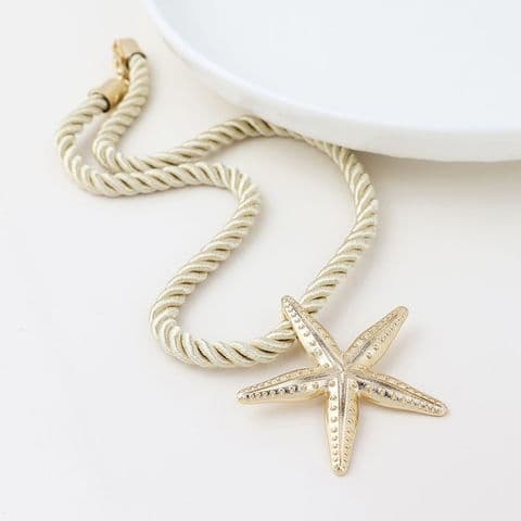 GOLDEN STARFISH OFF WHITE CORD NECKLACE