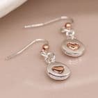 GP HEART IN SP DISC EARRINGS