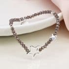 GREY BEAD BRACELET WITH SILVER PLATED SOLID AND OPEN STARS