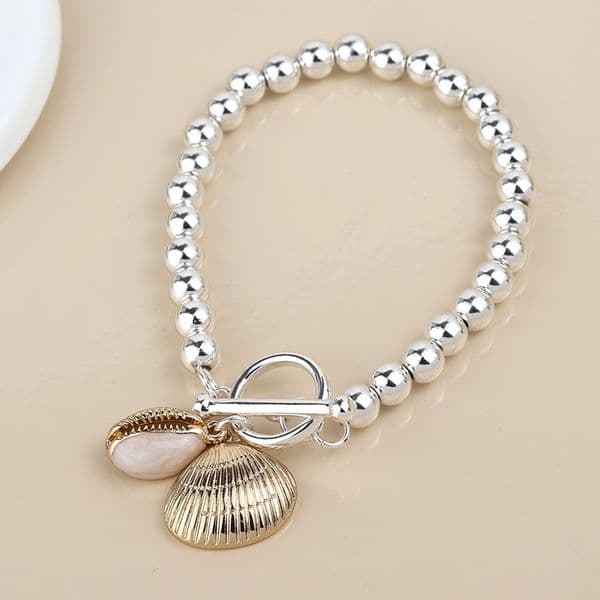 SILVER PLATED BEAD GOLDEN CLAM AND COWRIE SHELL CHARM BRACELET