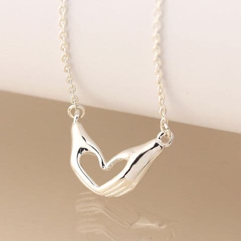 SILVER PLATED HEART HANDS NECKLACE