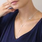 SILVER PLATED MULTI STAR LARIAT NECKLACE WITH CRYSTAL DETAIL
