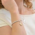 SILVER PLATED STRETCH BEADED AND DOUBLE HEARTS CHARM BRACELET