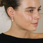 SILVER PLATED WORN HOOP EARRINGS WITH FAUX GOLD HAMMERED STARS